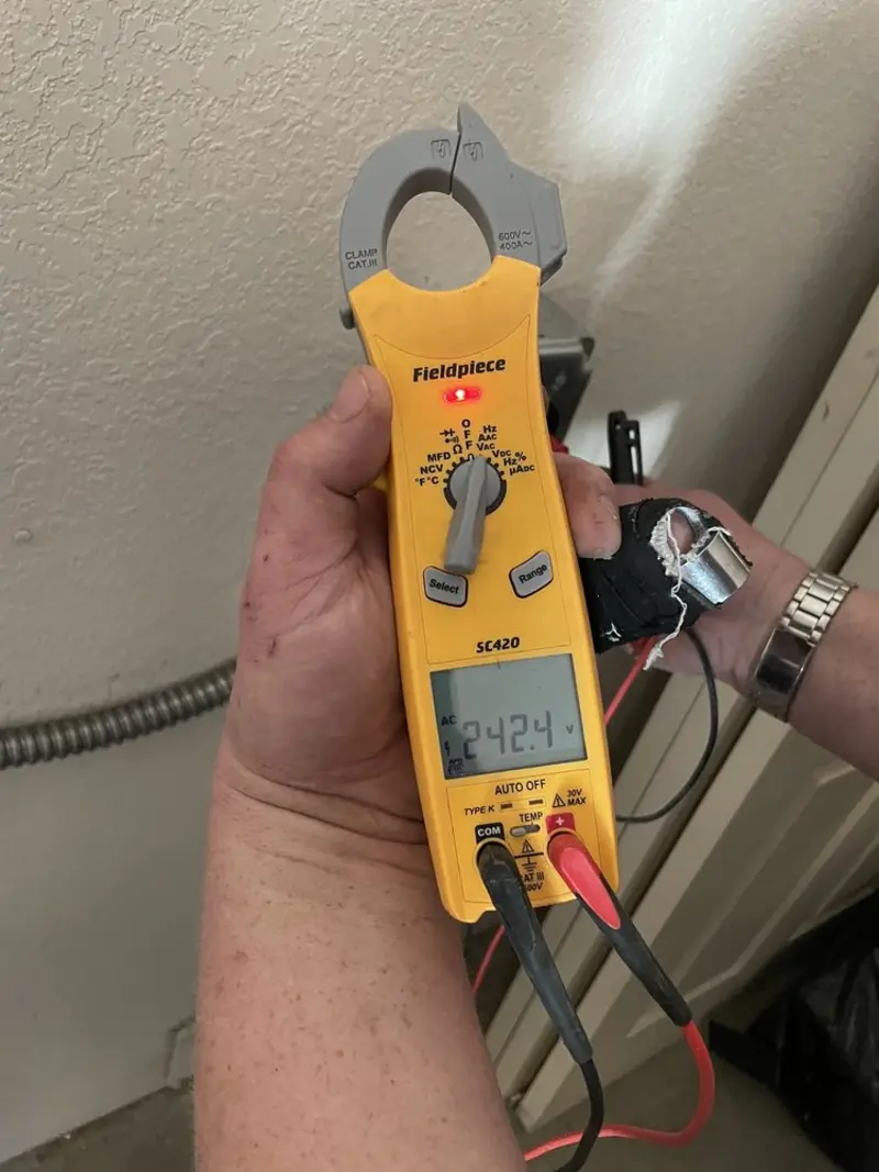 Voltage testing with clamp meter during Generator Installation in Riverton